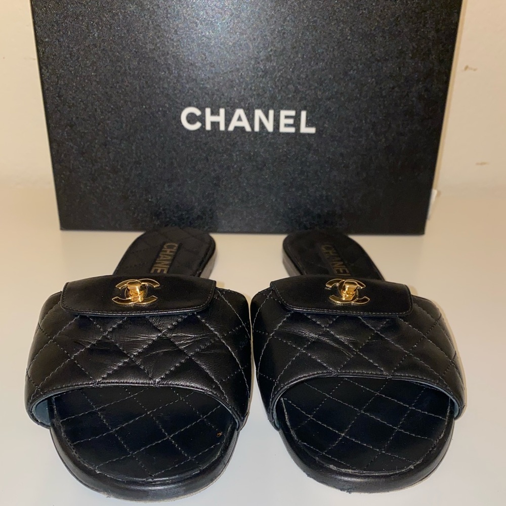 Authentic Chanel lock toe mules
